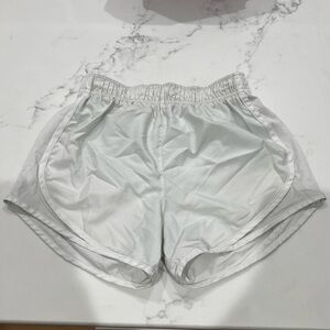 White Nike shorts